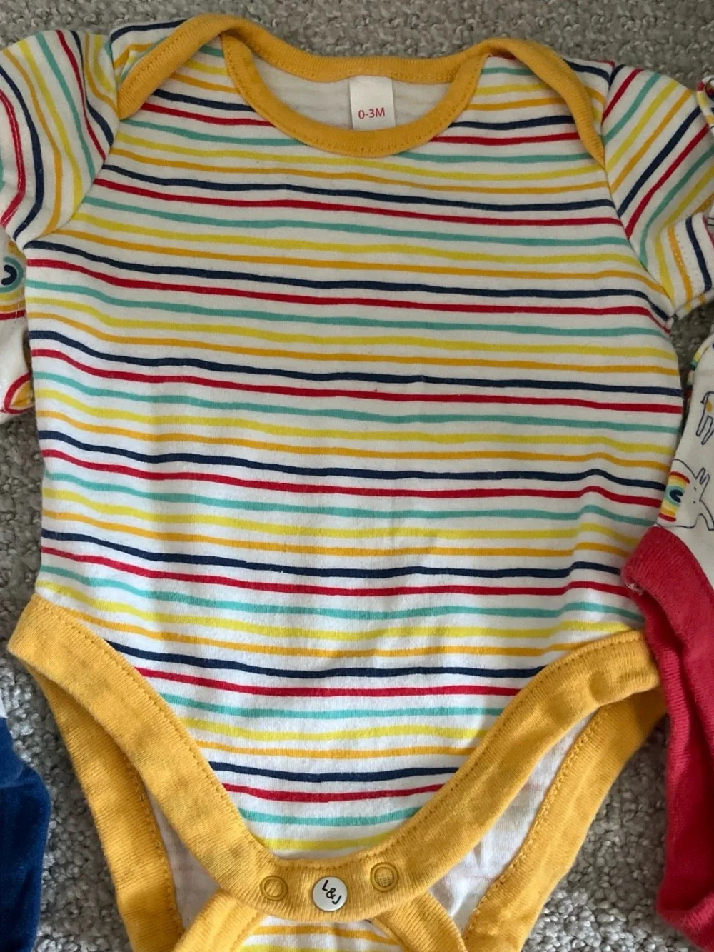 Baby Rainbow onesies